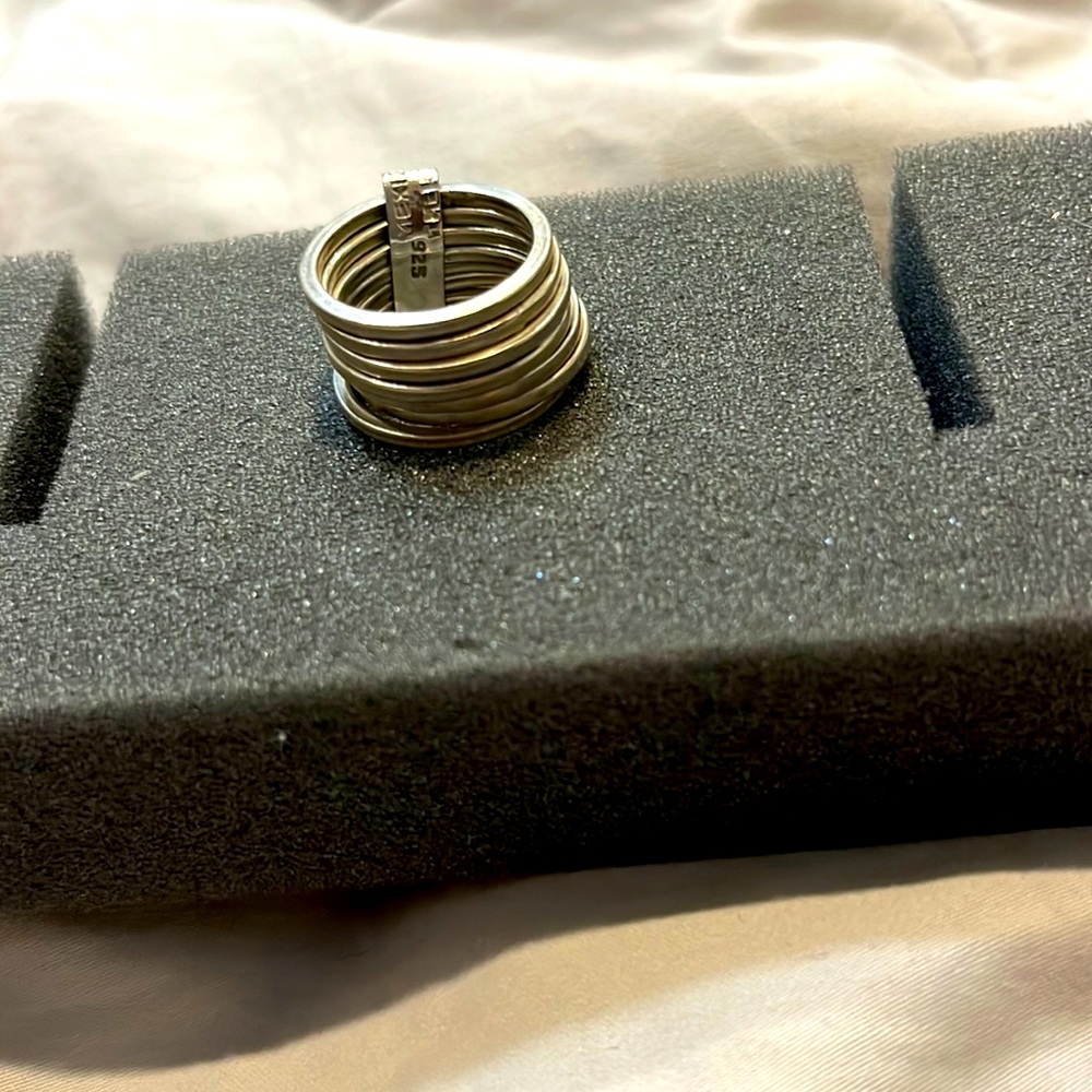 Sterling silver stack ring. Great condition. Seven individual rings